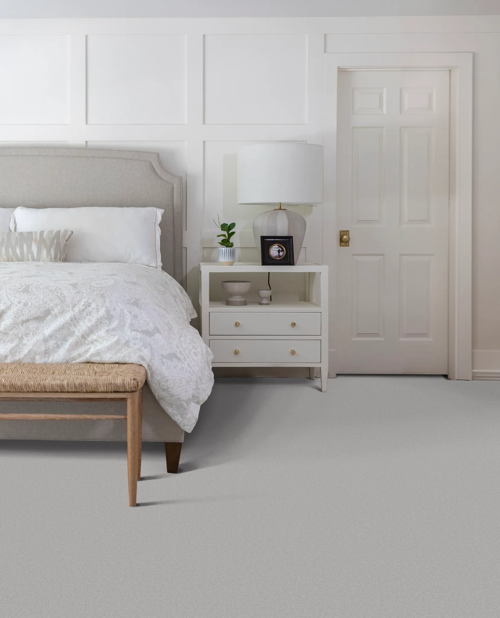 Cozy bedroom with soft surface flooring and elegant decor