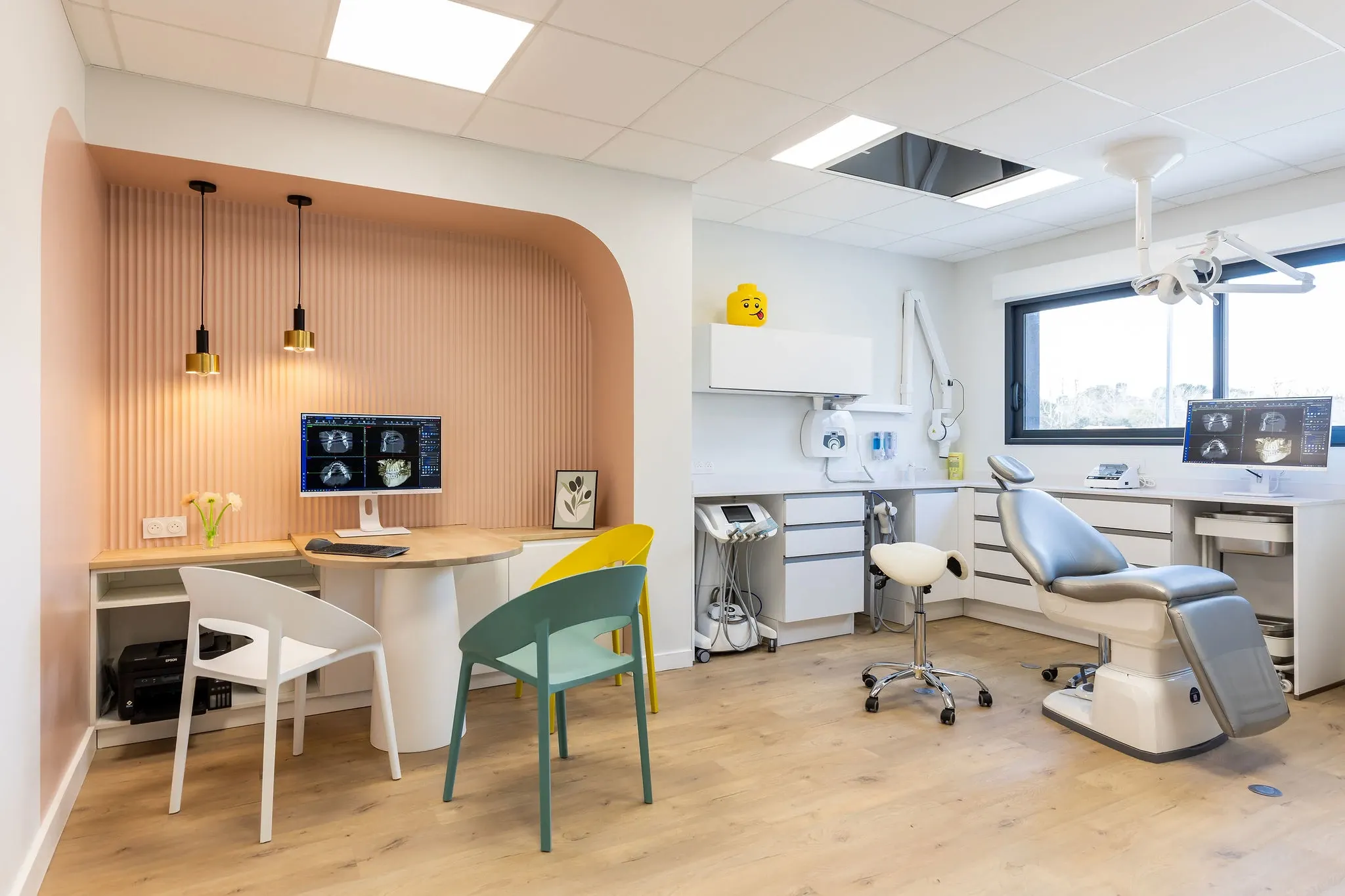 Modern dental office with light wood flooring