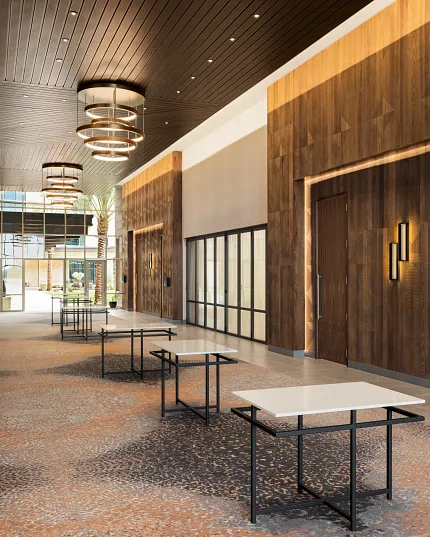Modern Hospitality Facility with Commercial Carpet Tile Flooring Spacious hospitality facility with modern design featuring commercial carpet tile in a blend of brown and beige tones