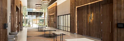 Modern Hospitality Facility with Commercial Carpet Tile Flooring Spacious hospitality facility with modern design featuring commercial carpet tile in a blend of brown and beige tones