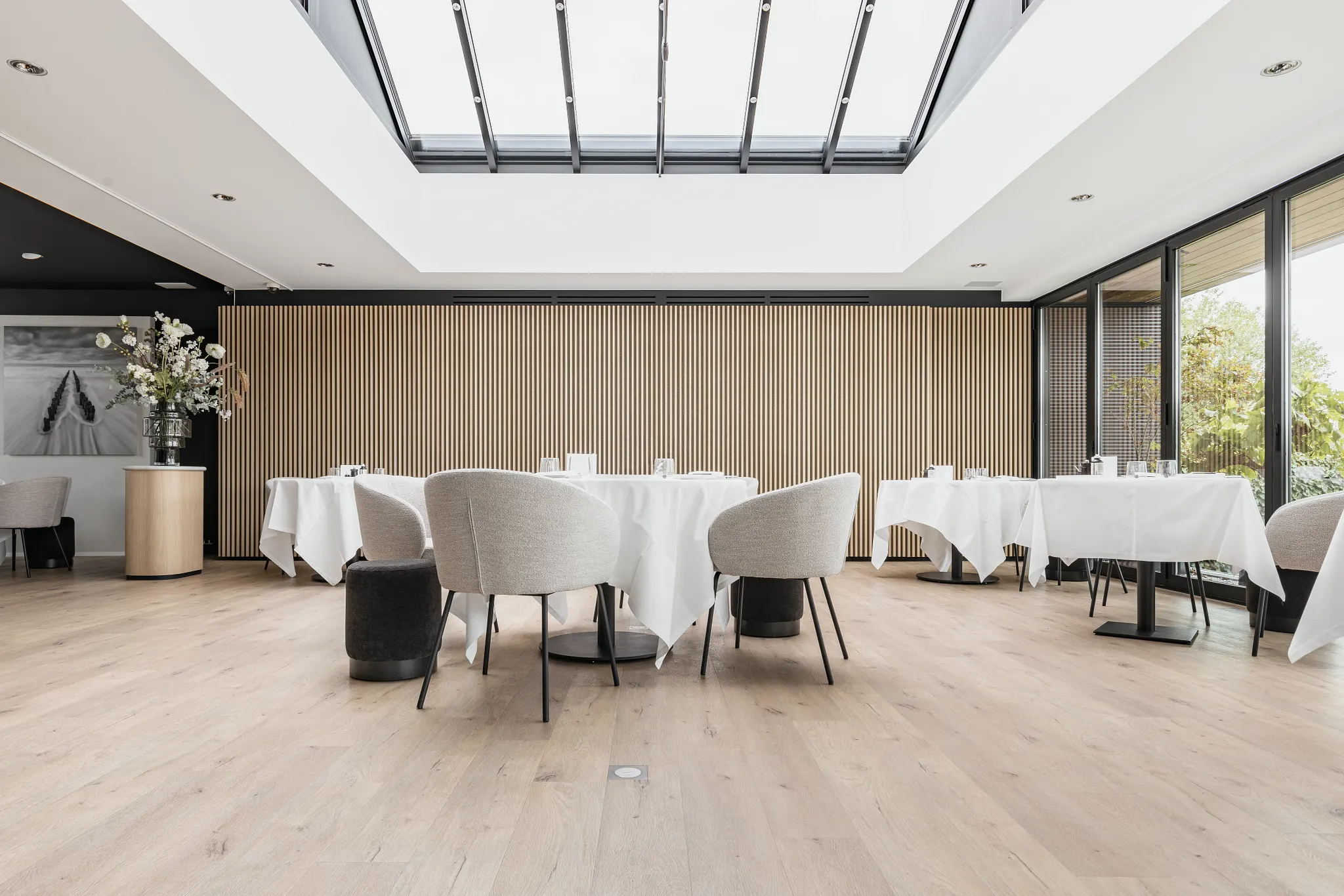 Modern dining area with wood look vinyl flooring