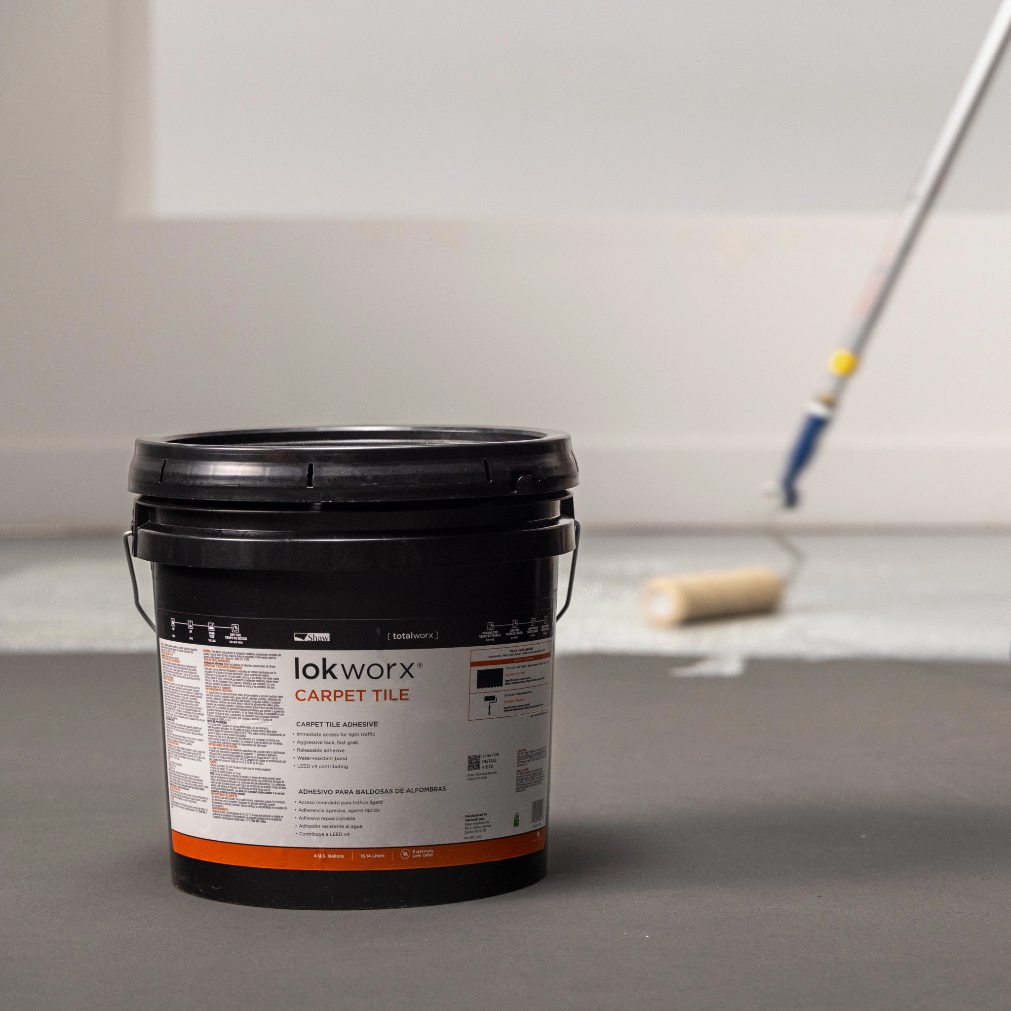 Lokworx Carpet Tile Adhesive bucket with roller in background