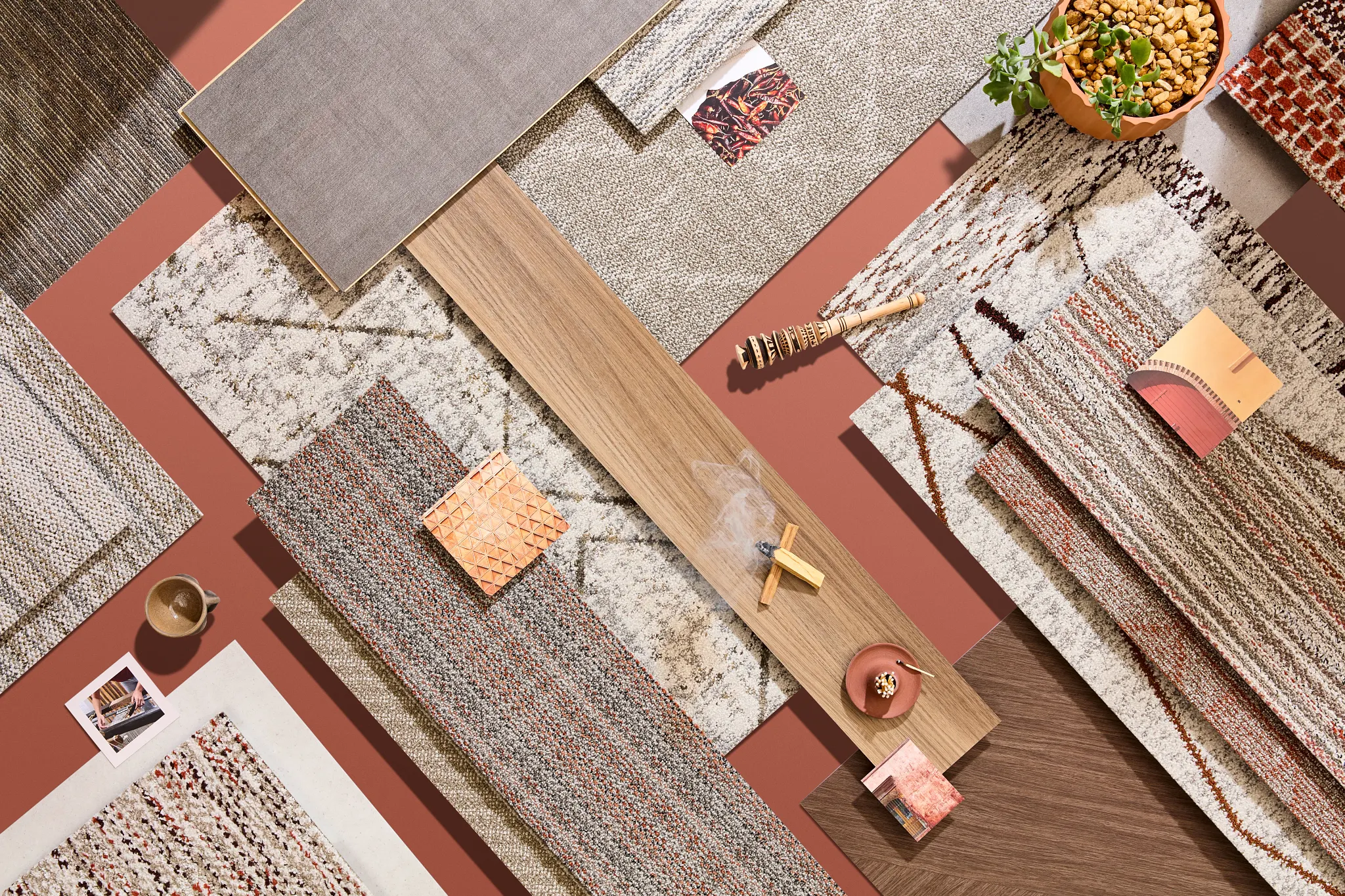 Assorted carpet and flooring samples in neutral and earthy tones