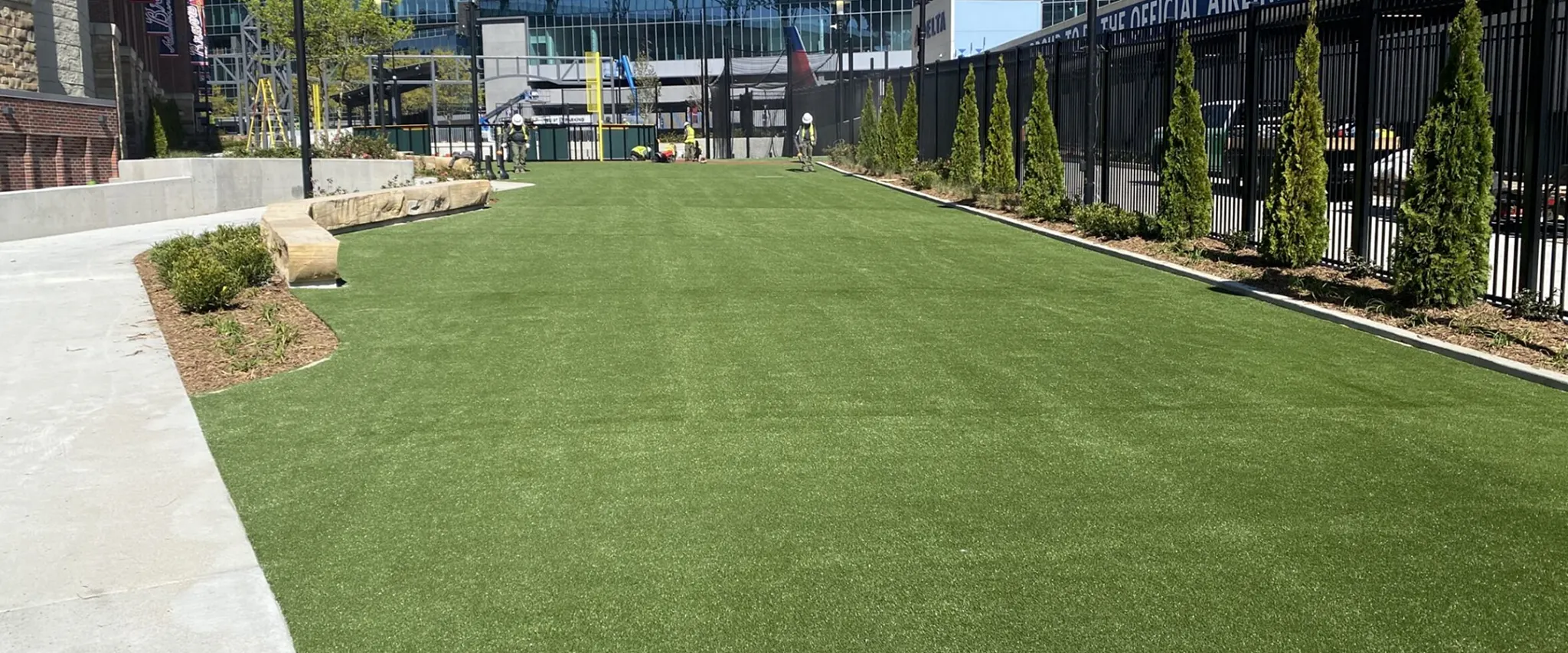 Outdoor artificial grass landscape with modern buildings