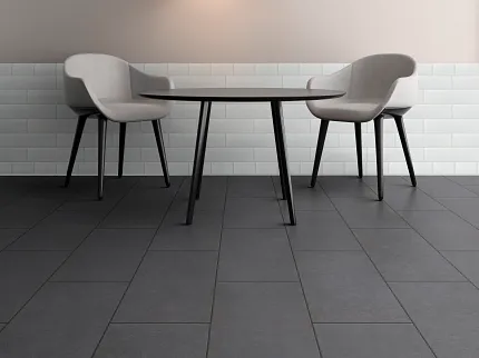 Contemporary dining room with dark grey commercial ceramic tile flooring and stylish lighting fixtures Modern dining area with black and white pendant lights, grey chairs, and dark grey commercial ceramic tile flooring