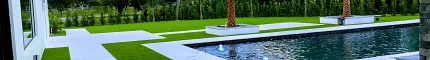 Modern backyard with pool and artificial grass
