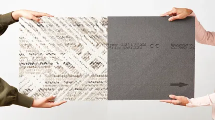 Common Thread Carpet Tile with EcoWorx Backing | Sustainable Flooring by Shaw Contract Person holding a Common Thread carpet tile beside its EcoWorx backing, showcasing sustainable flooring construction and material transparency.
