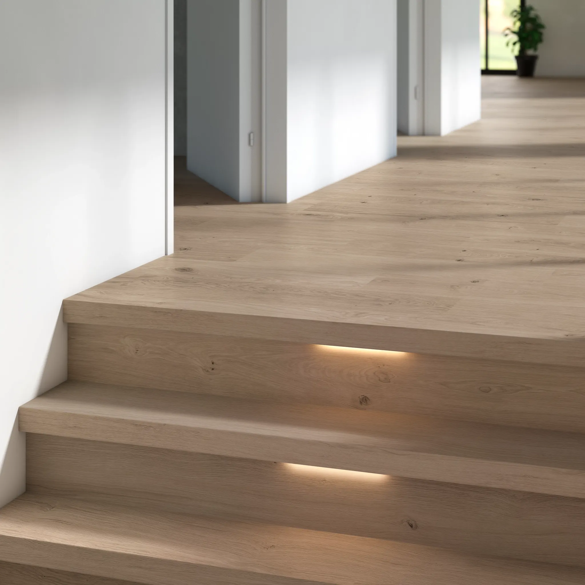 Modern staircase with light wood look luxury vinyl plank flooring in a bright residential setting
