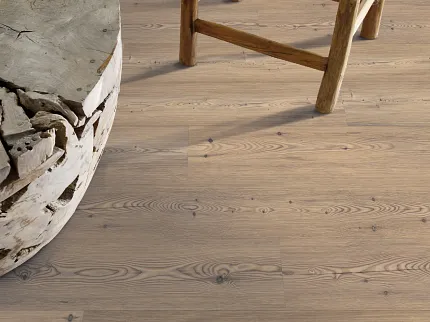 Light Oak Laminate Flooring for a Cozy and Durable Home Environment Rustic wooden stool and natural wood table on light oak laminate flooring