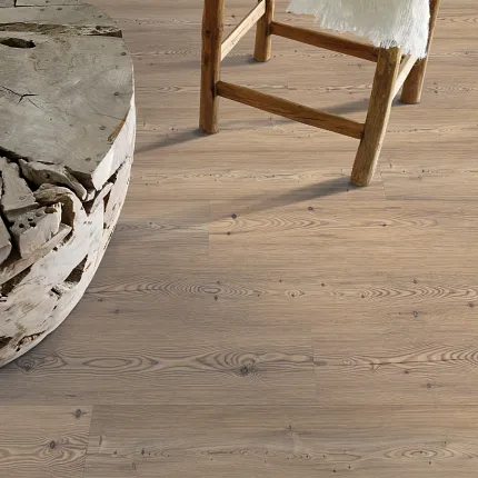 Light Oak Laminate Flooring for a Cozy and Durable Home Environment Rustic wooden stool and natural wood table on light oak laminate flooring