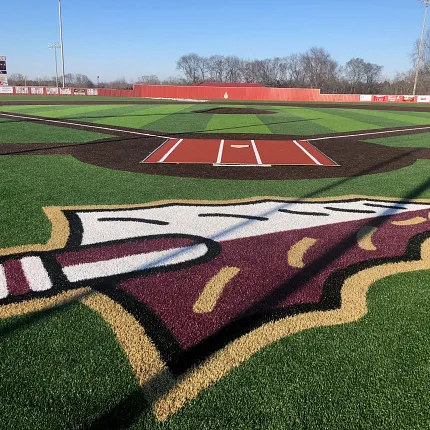Artificial Turf Baseball Field with Logo Artificial turf baseball field with logo and scoreboard in background