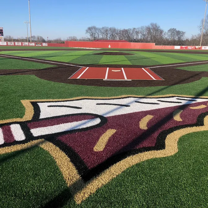 Artificial Turf Baseball Field with Logo Artificial turf baseball field with logo and scoreboard in background