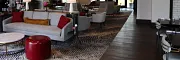 Sophisticated hospitality interior design with chic furnishings Stylish hospitality lounge with elegant seating and modern decor