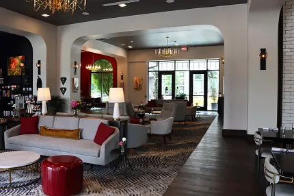 Sophisticated hospitality interior design with chic furnishings Stylish hospitality lounge with elegant seating and modern decor