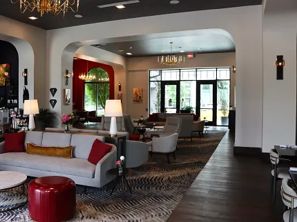 Sophisticated hospitality interior design with chic furnishings Stylish hospitality lounge with elegant seating and modern decor