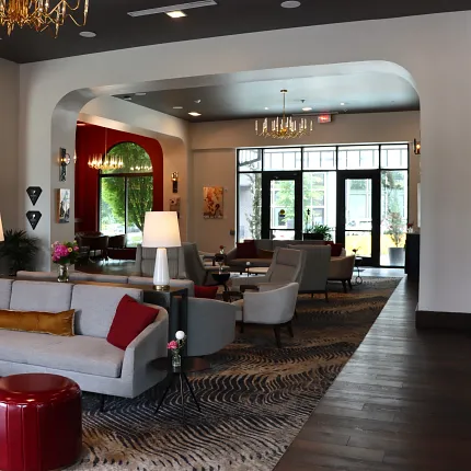 Sophisticated hospitality interior design with chic furnishings Stylish hospitality lounge with elegant seating and modern decor