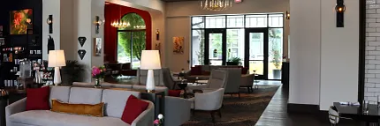 Sophisticated hospitality interior design with chic furnishings Stylish hospitality lounge with elegant seating and modern decor