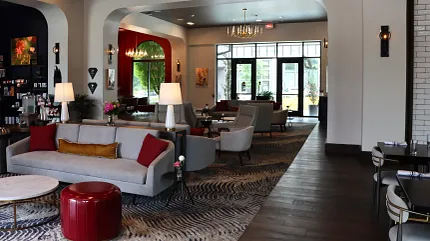 Sophisticated hospitality interior design with chic furnishings Stylish hospitality lounge with elegant seating and modern decor