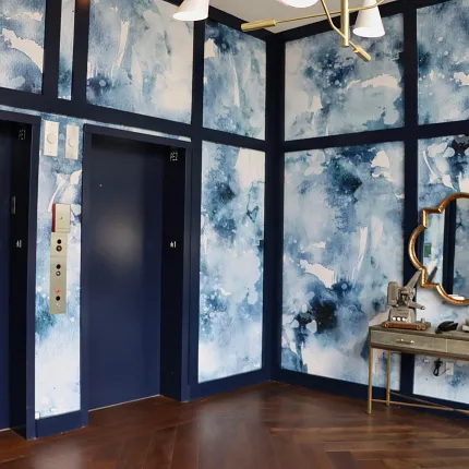 Stylish lobby design with contemporary wood flooring Modern elevator lobby with blue abstract walls and dark wood flooring