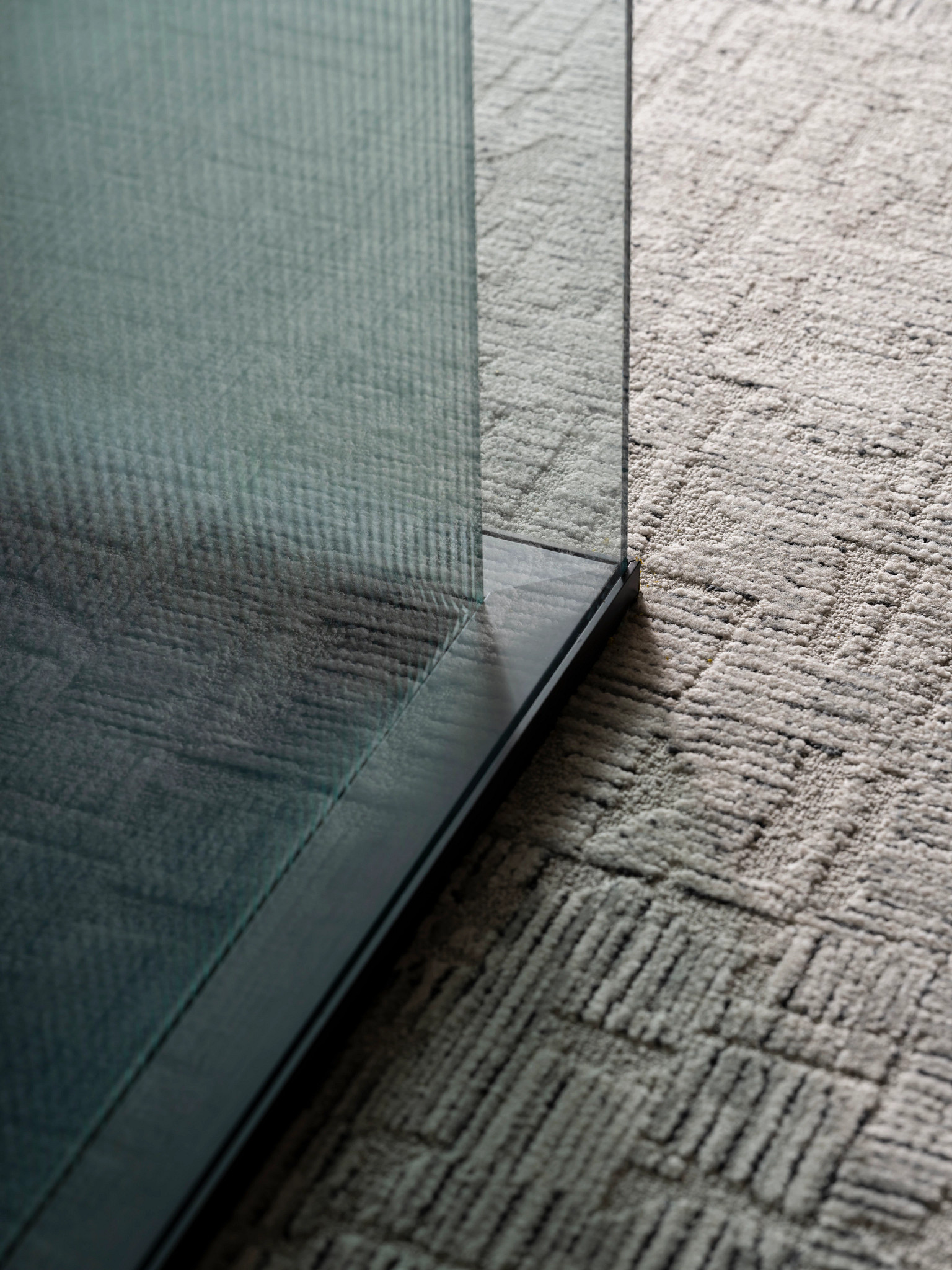 Close-up of commercial carpet tile with geometric pattern