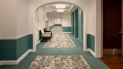 Stylish carpet design for sophisticated interiors Elegant hallway with patterned carpet and teal wall accents