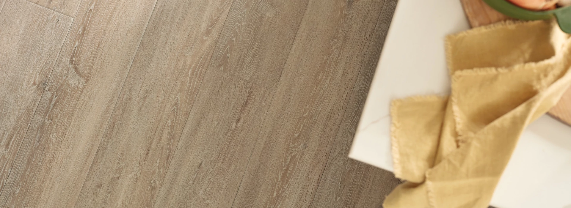 Zoom in on flooring and a dining room table