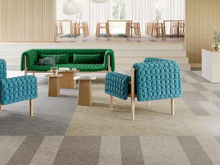Education Facility with Commercial Carpet Tile Flooring and Vibrant Seating Arrangement Modern education facility with colorful seating and patterned commercial carpet tile flooring
