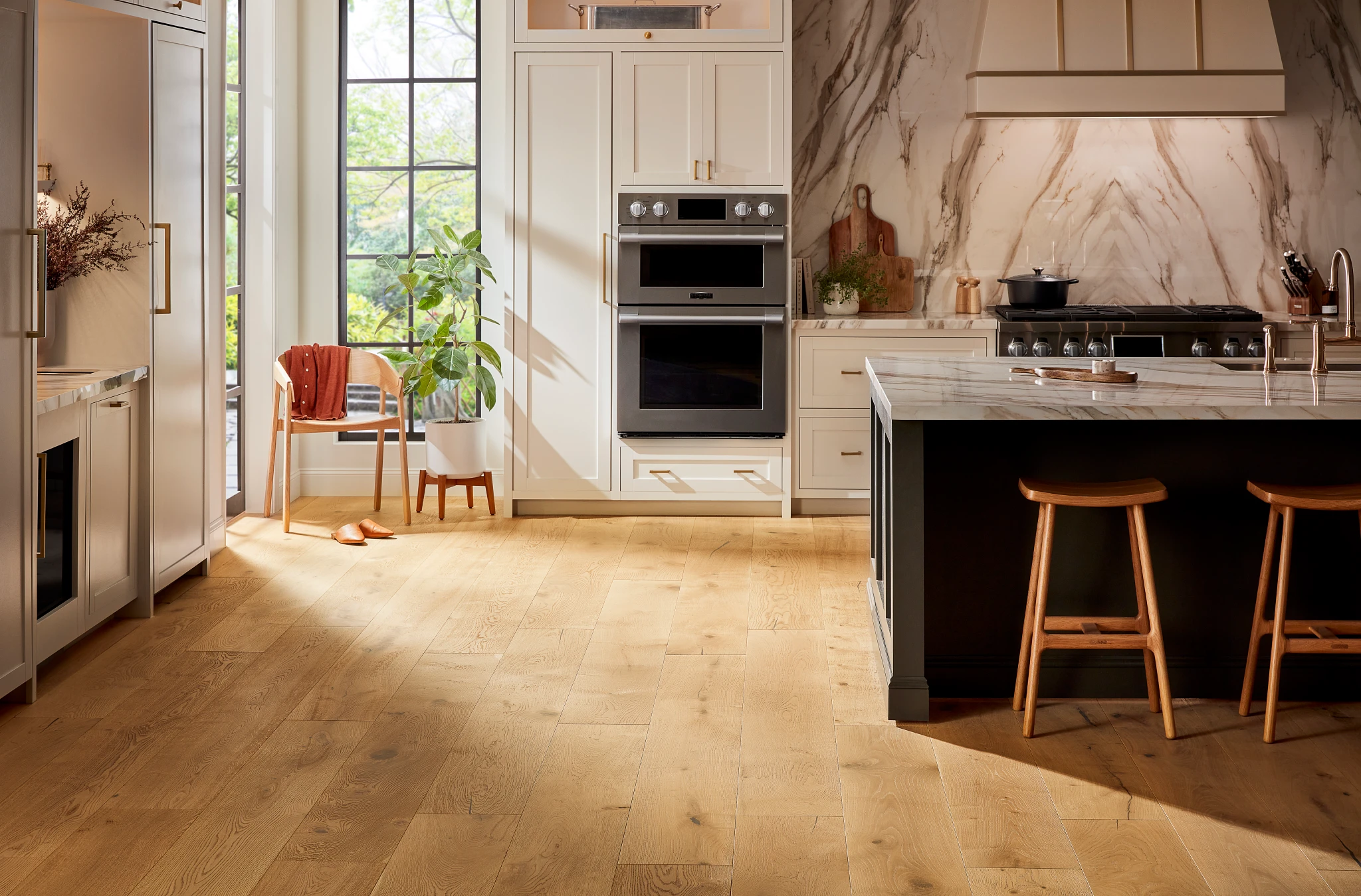 Modern kitchen with natural light hardwood flooring