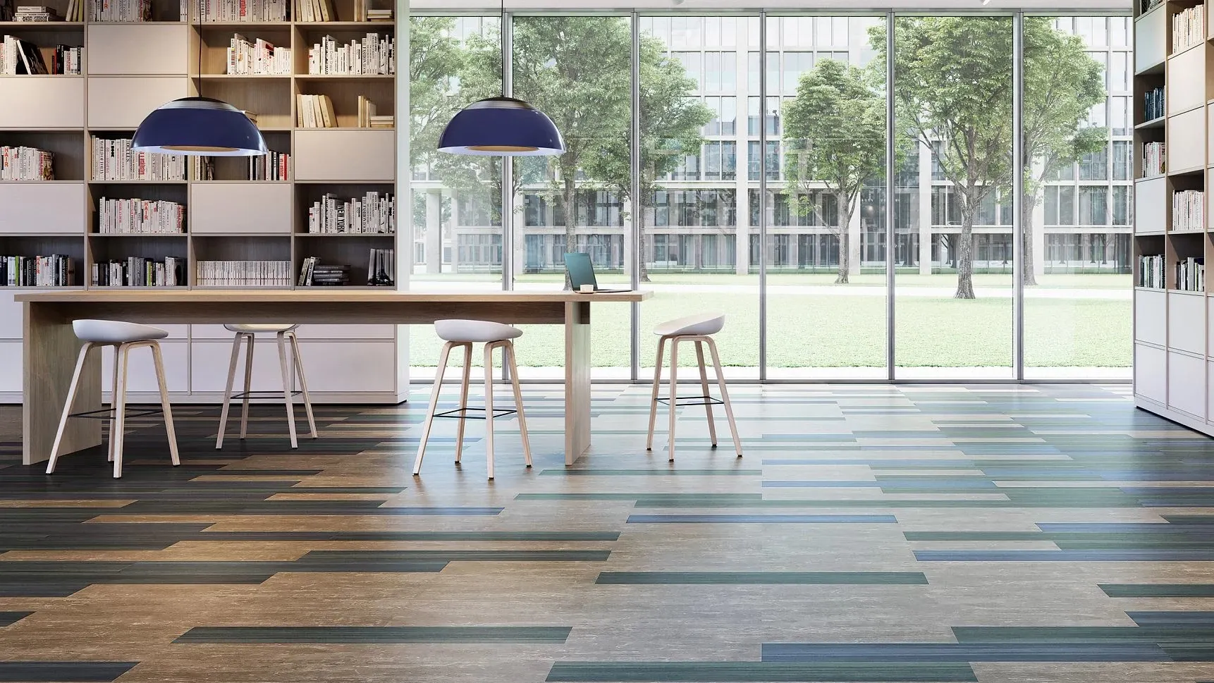Modern education facility with large windows, bookshelves, and stylish seating on patterned flooring