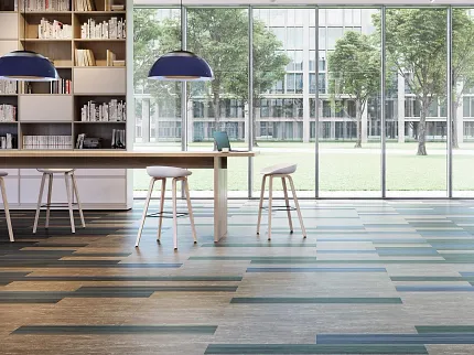 Education Facility with Contemporary Flooring and Interior Design Modern education facility with large windows, bookshelves, and stylish seating on patterned flooring