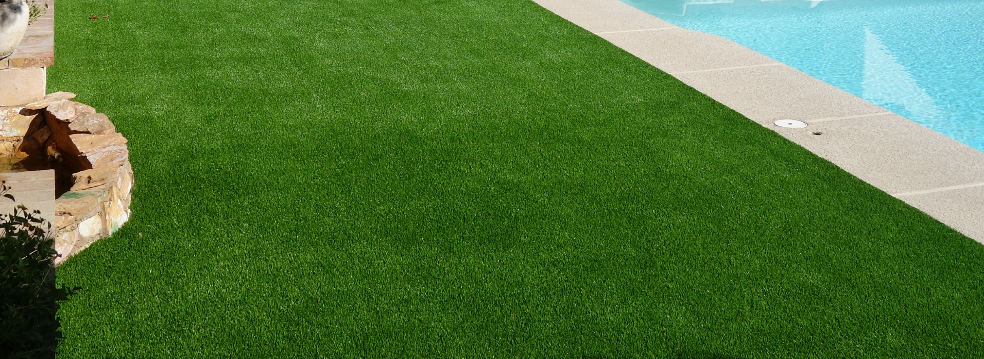 Turf next to a pool