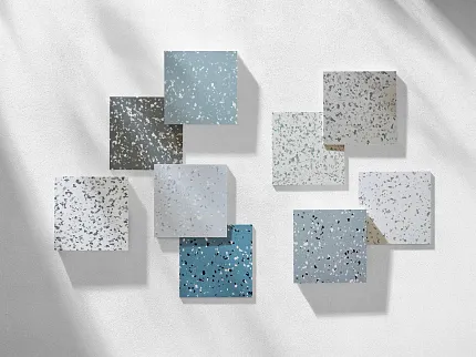 Vibrant vinyl flooring options for versatile interiors Vinyl flooring swatches in red, teal, navy, green, purple, and blue