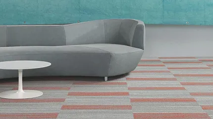 Stylish carpet tiles for contemporary spaces Modern living room with gray and orange carpet tiles