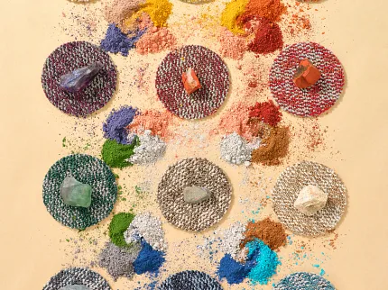Diverse carpet swatches for creative interiors Assorted carpet samples with vibrant color powders