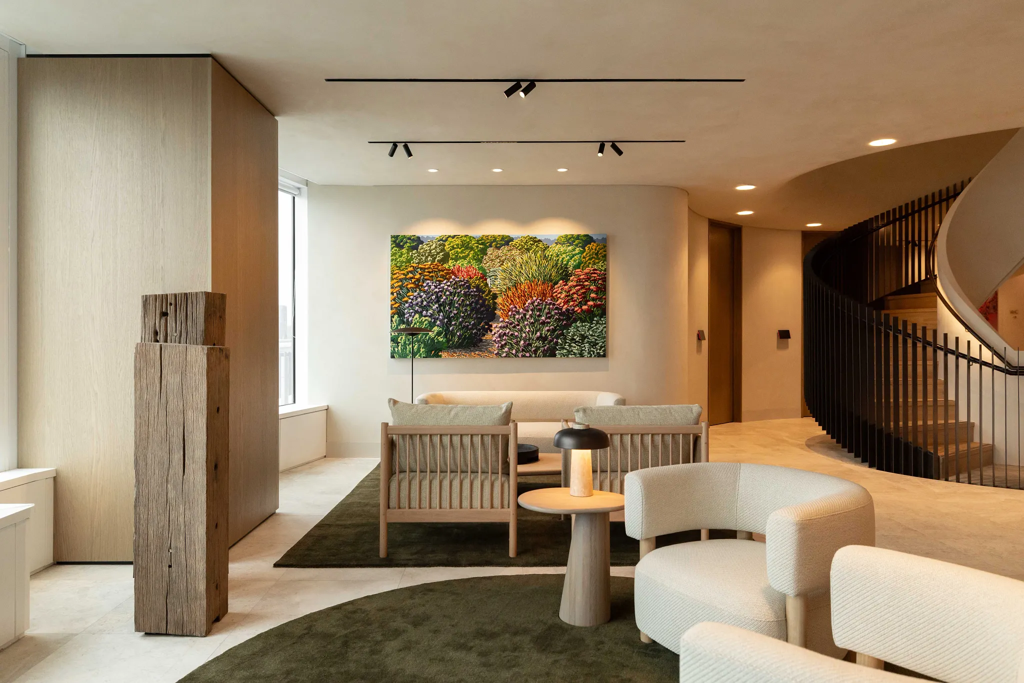 Modern living room with elegant seating and artwork