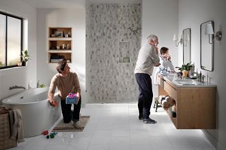 father, son and grandfather in bathroom featuring coretec tile flooring