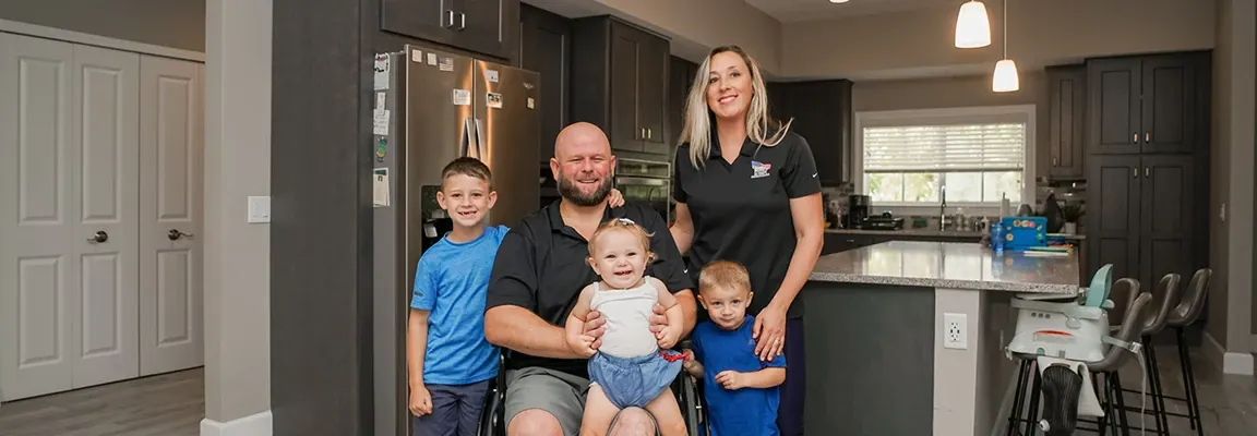 Modern kitchen with family and luxury vinyl flooring