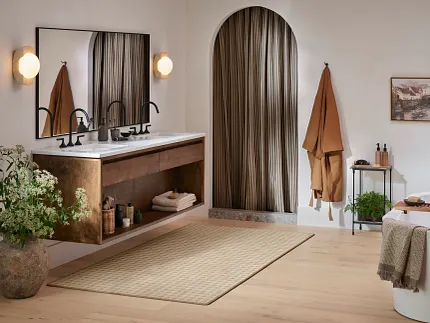 Beige Carpet and Hardwood Flooring in Stylish Bathroom Decor Elegant bathroom with a large beige carpet on hardwood flooring
