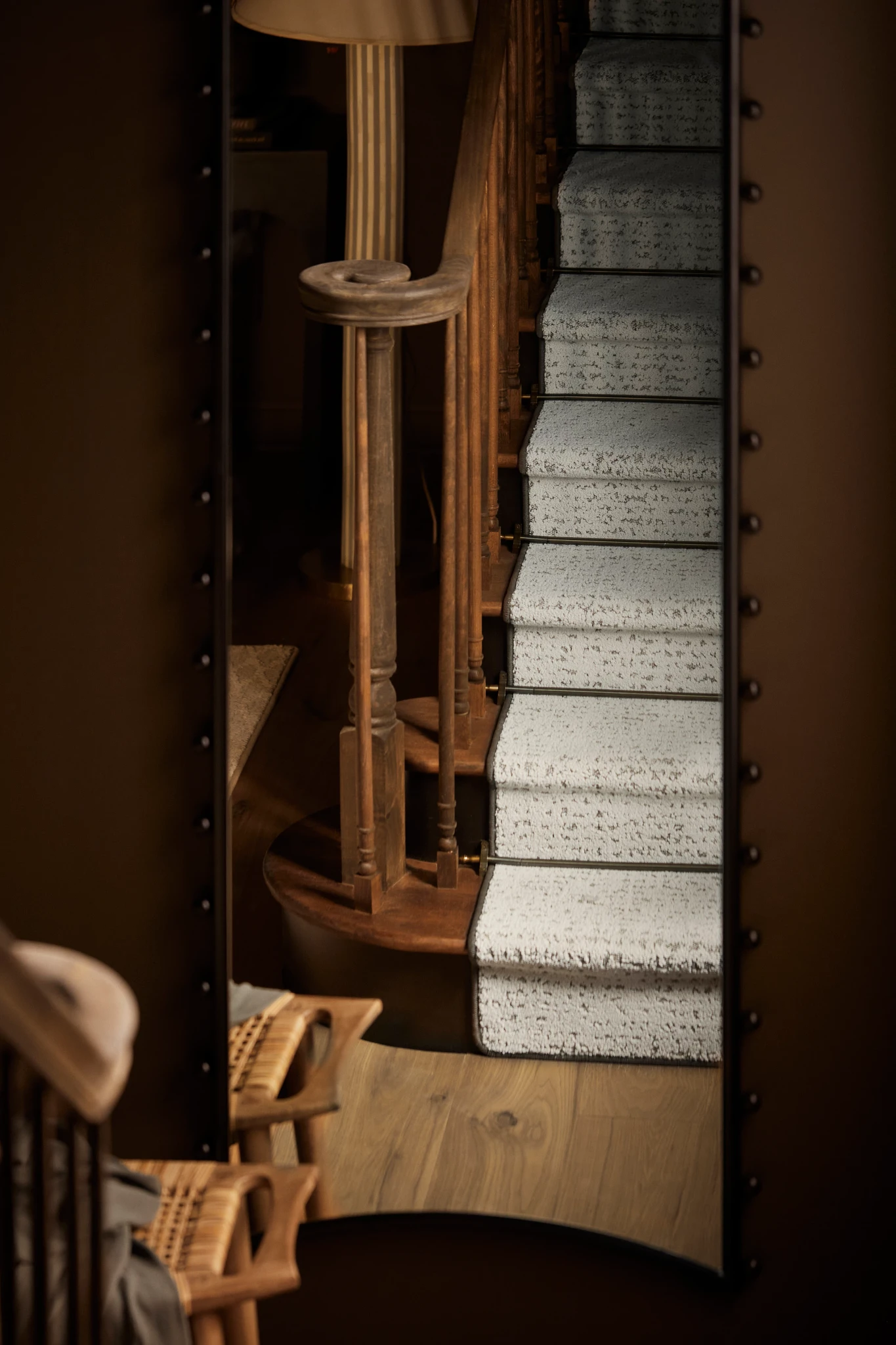 Elegant carpeted staircase in a warm