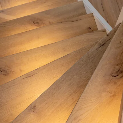 Natural oak wood flooring on staircase