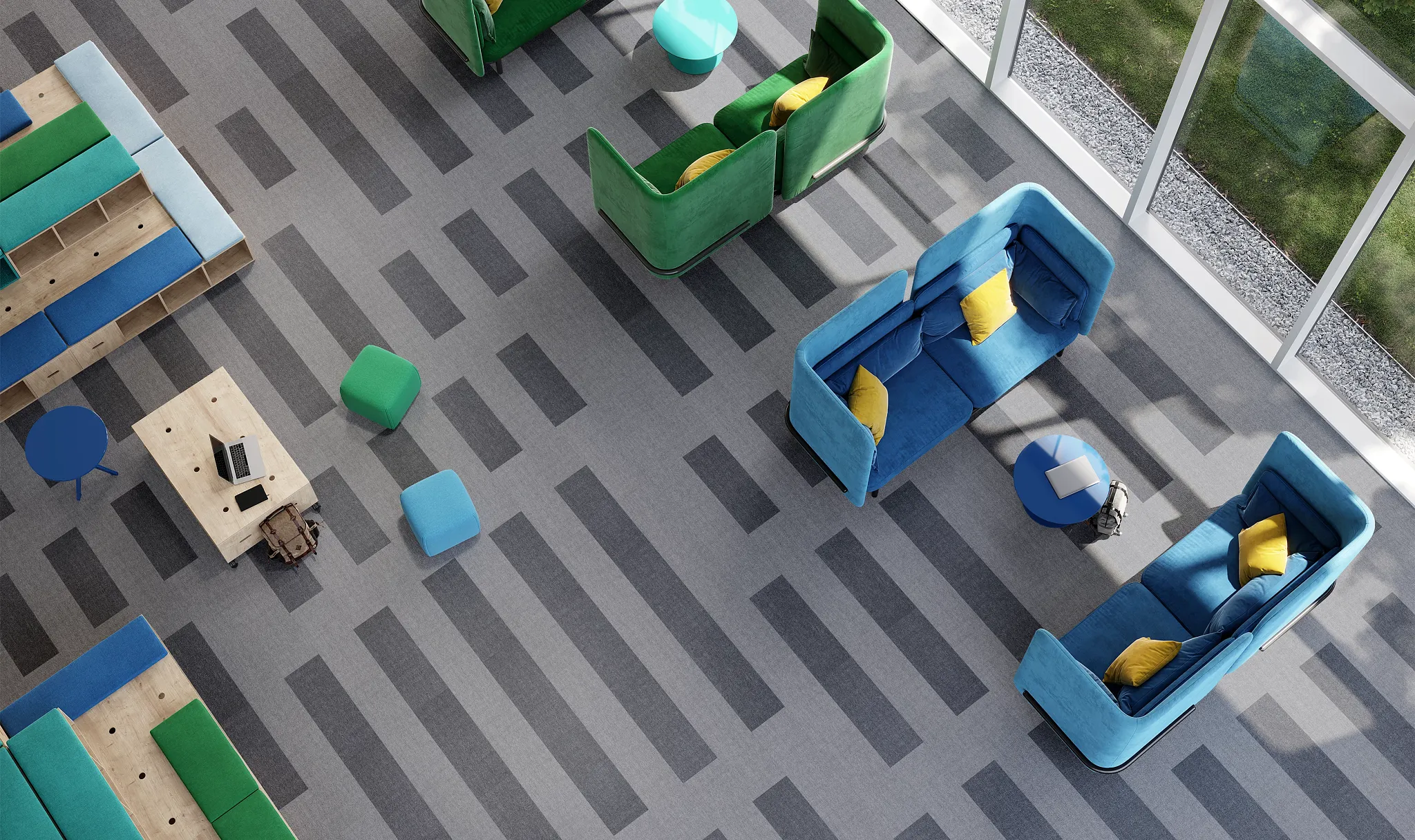 Modern office space with striped carpet flooring and colorful seating