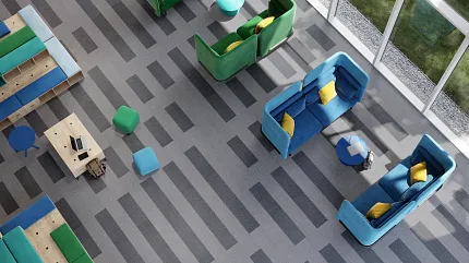 Stylish carpet flooring for vibrant office environments Modern office space with striped carpet flooring and colorful seating
