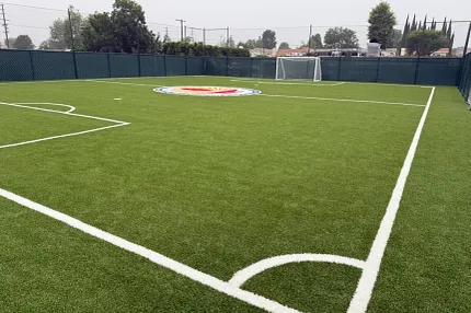 Durable artificial grass for sports fields Artificial turf soccer field with white markings