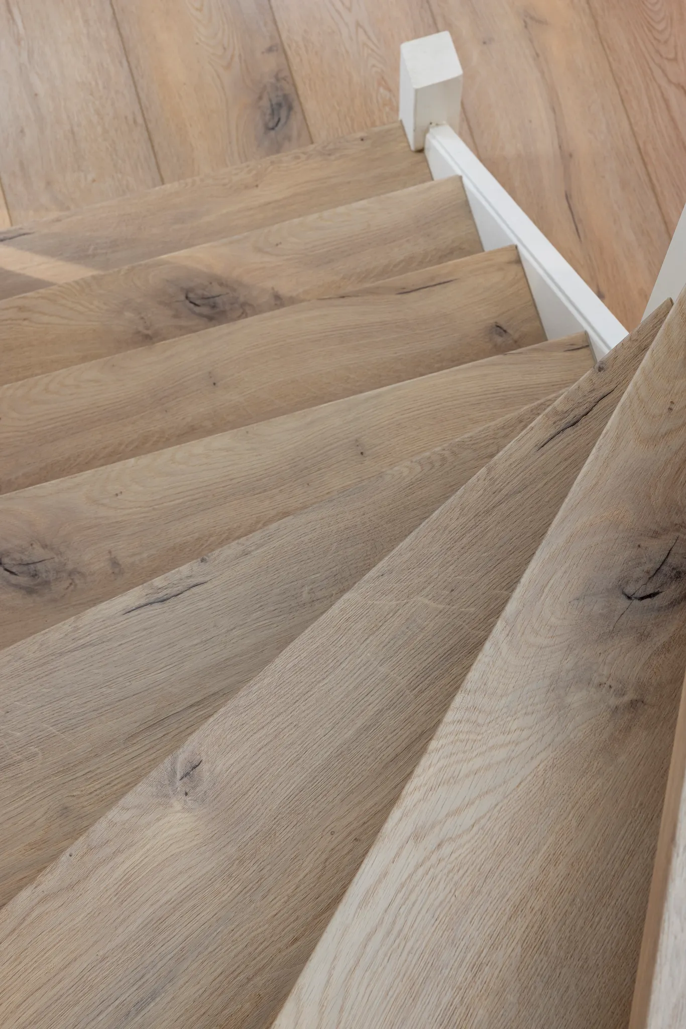 Natural oak wood flooring on staircase