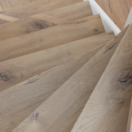 Natural oak wood flooring on staircase