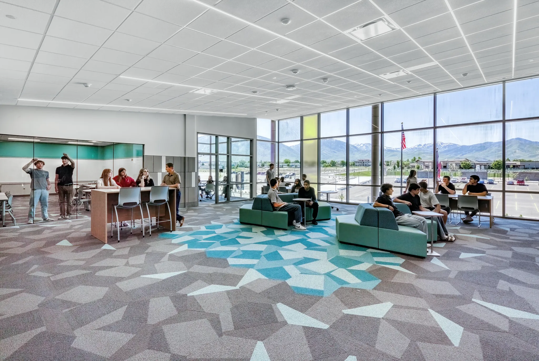 Deseret Peak High School collaborative space with blue and gray carpet tile