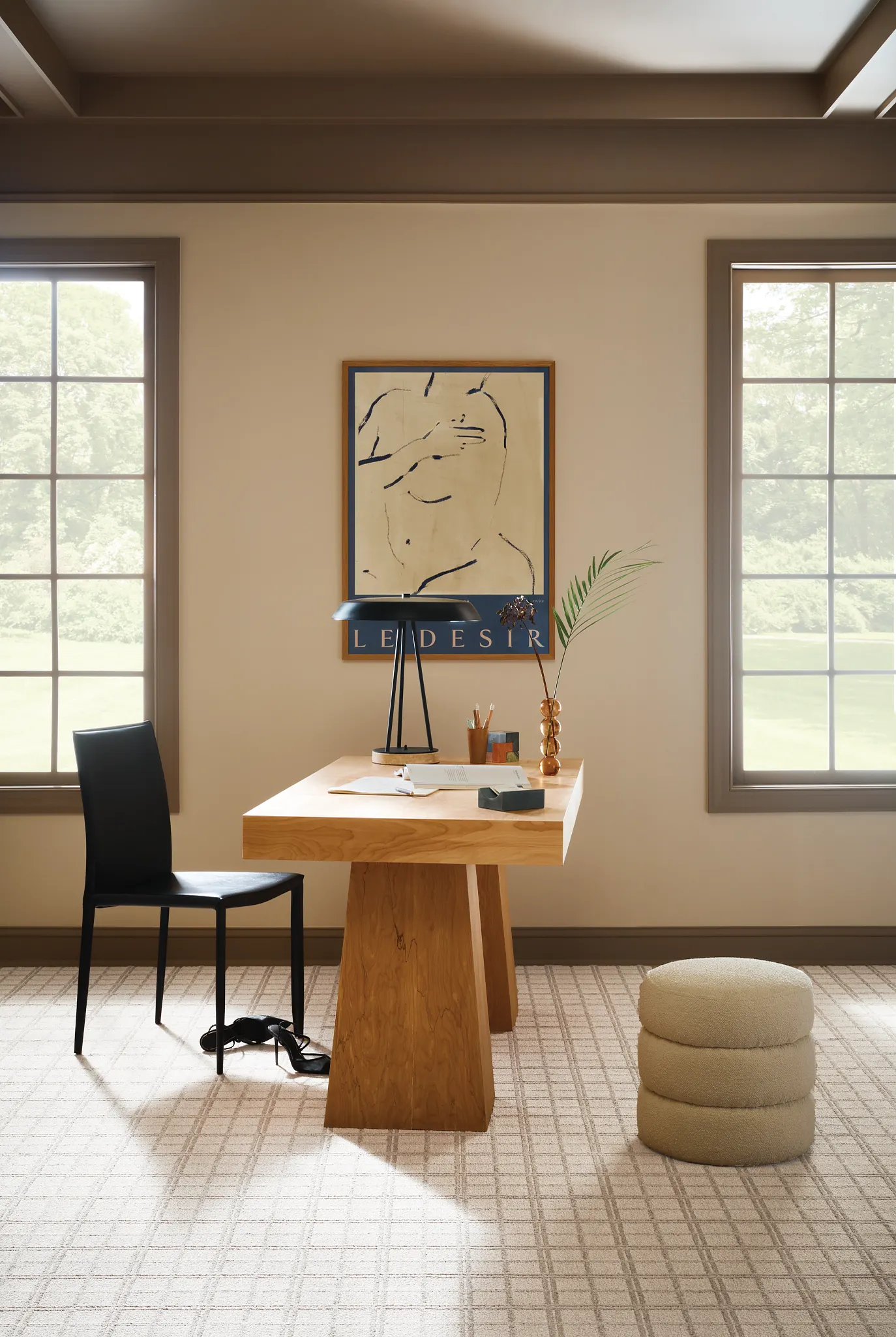 Elegant office space featuring a broadloom carpet in beige with a subtle grid pattern