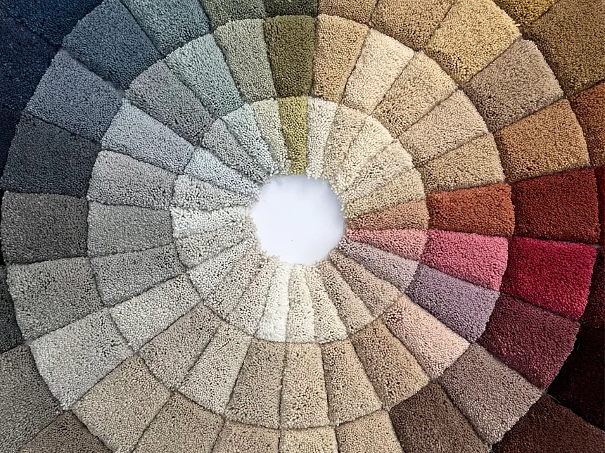 Explore Our Diverse Carpet Patterns in Blue Close-up view of various carpet swatches featuring patterns in blue