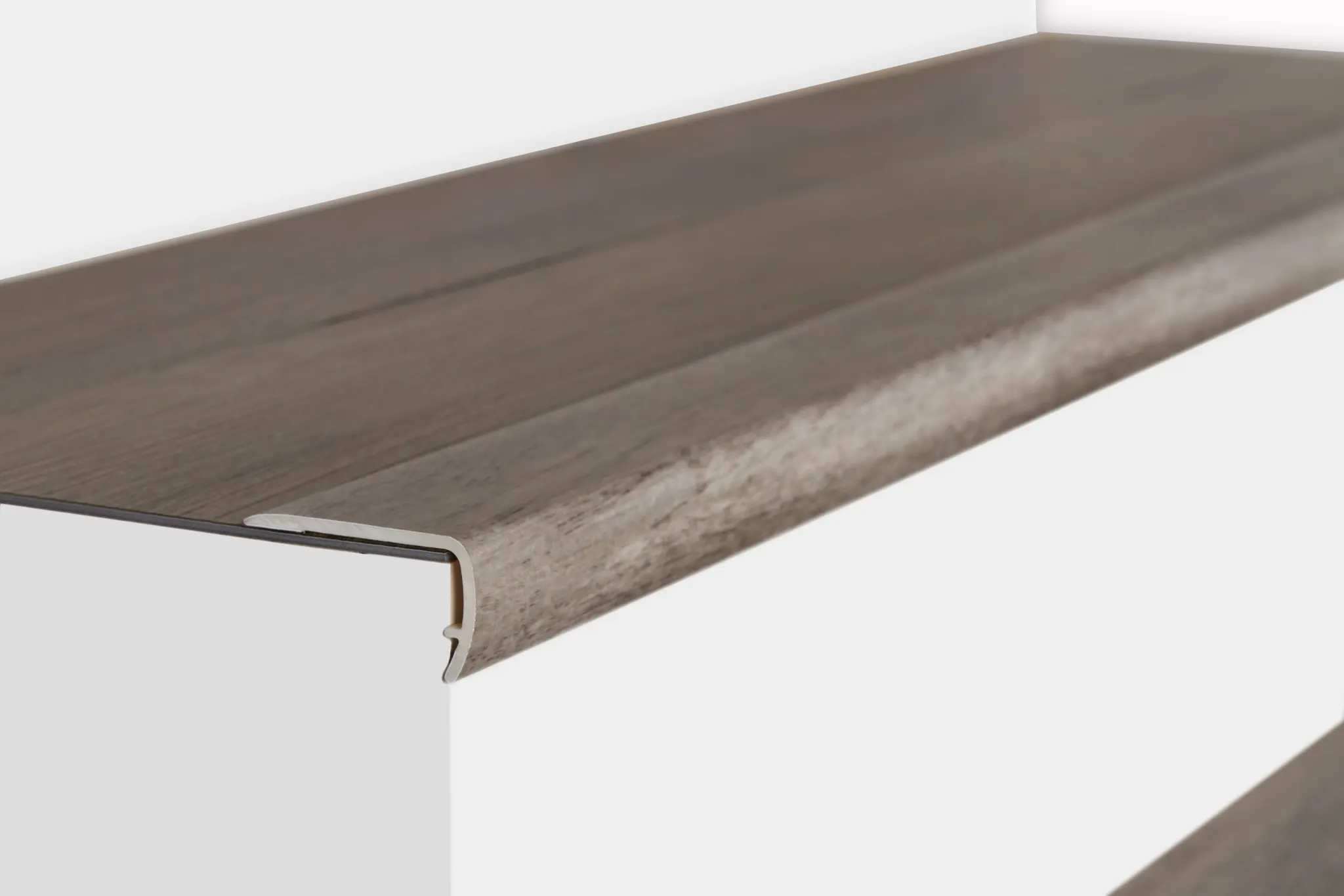 Brown wood-look stair nose molding for flooring