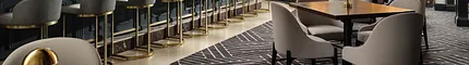 Modern carpet design for upscale hospitality spaces Stylish hospitality bar with patterned carpet flooring